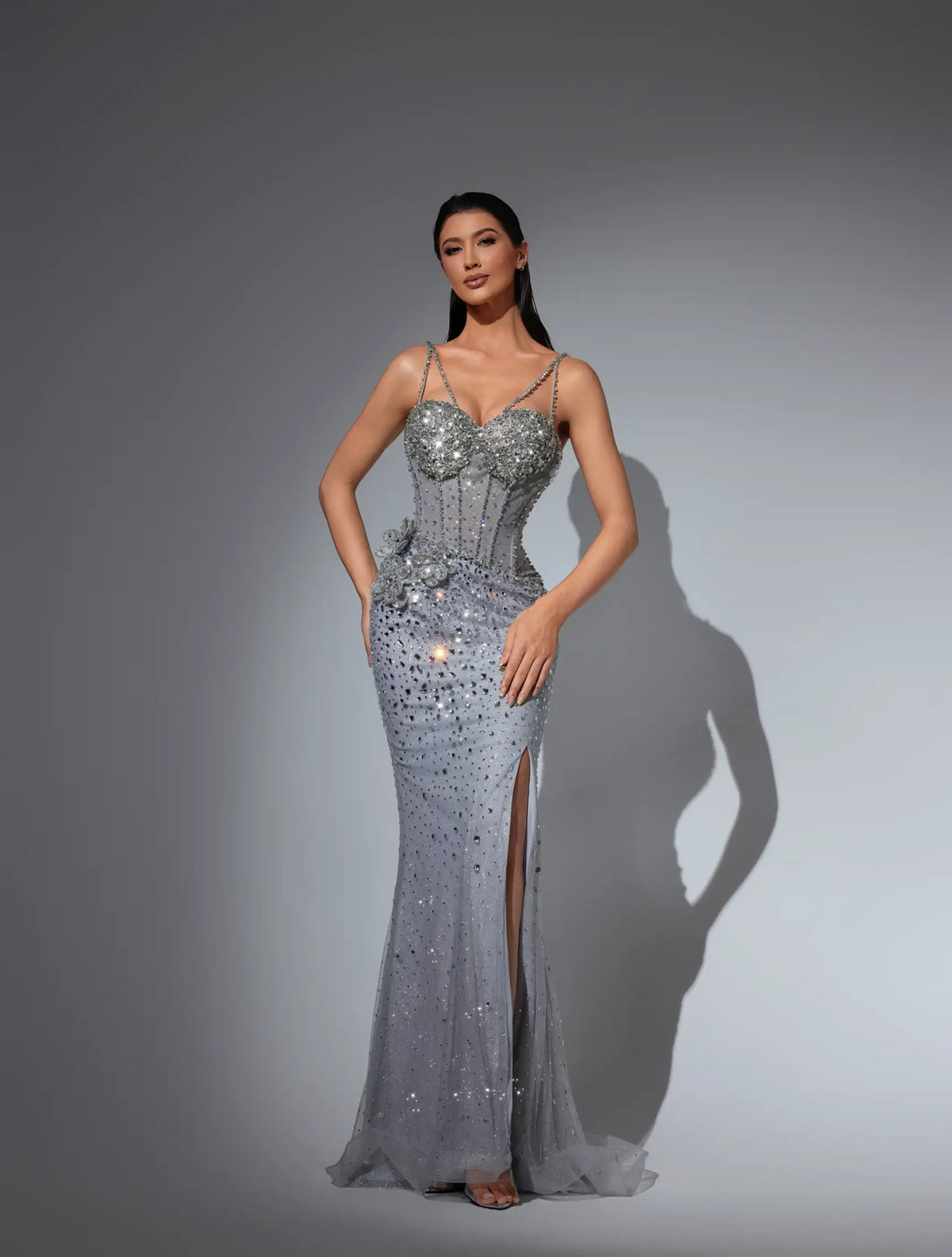Elmarissea Luxe evening dress Dubai, Spaghetti Strap Slit Gown in Liquid Silver Sequin with V-Neck | Fostani One Main image